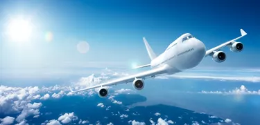 Airplane flying above clouds