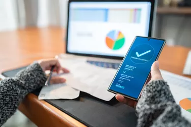 Woman Using banking app on the smartphone pay utility  bill, financial Technology internet banking concept