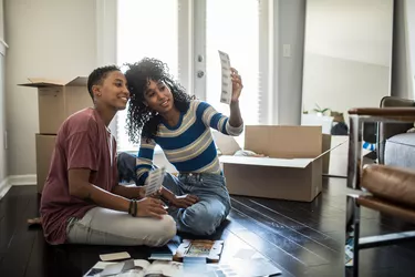 Lesbian couple picking paint colors for new home