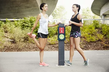 Two Women (21-30 Year Olds) Running Outdoors