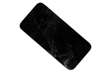 Broken smartphone isolated on white background. The smartphone display is broken.