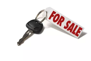 Car Key with For Sale Tag Isolated on White Background