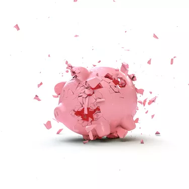 piggy bank shattering to the ground.
