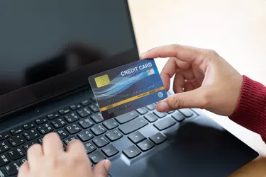 Online payment using credit card. Input card number for online money transaction.
