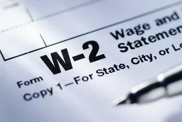 Pen on a Form W-2 Wage and Tax Statement