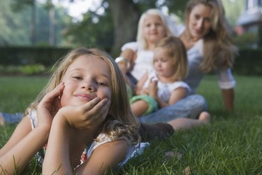 Girl lying in grass