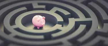 piggy bank at center of labyrinth