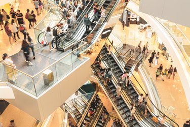 busy escalators in mall