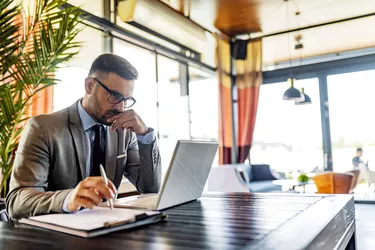 man working at laptop