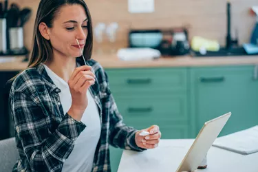 woman doing COVID self-test