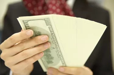 Businesswoman Counting a money