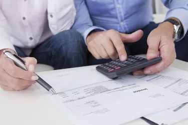 Close-up of couple doing finances at home