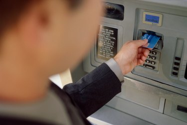 Person making an ATM transaction