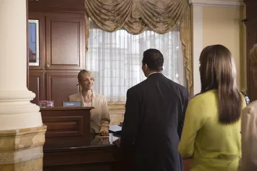 People waiting in line at bank