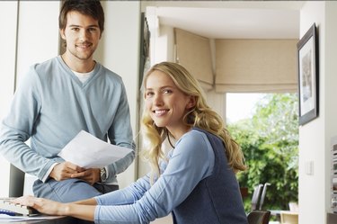 Young Couple Looking at Documents