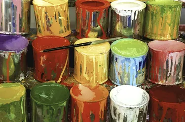 Close-up of large group of paint cans