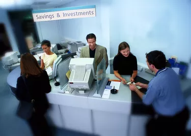 high angle view of customers and employees at a bank