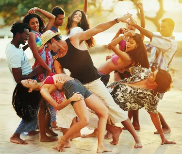 People Dancing at a Beach Party