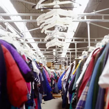Clothes racks with plastic hangers, low angle view
