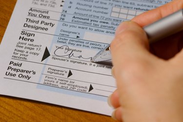 Signing Blue Tax Form