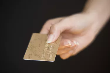 Woman paying with a credit card