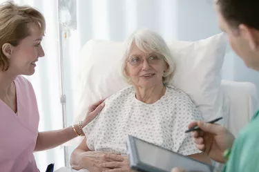 Patient talking to physicians at hospital