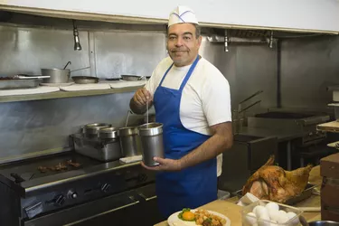 Hispanic male cook in kitchen