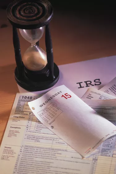 Hourglass and tax forms