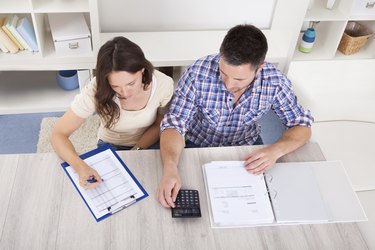 Couple Calculating Bills