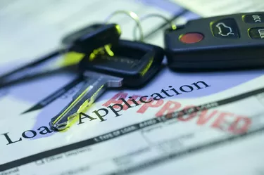 Car keys and approved loan application
