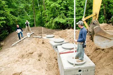 Surveying crew at construction site