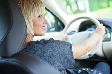 attractive woman driver in her car