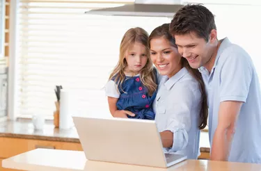 Family using a laptop