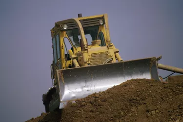 Bulldozer pushing dirt