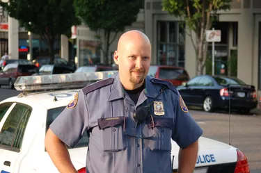 Police Officer Outside by Cars