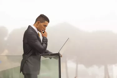 Modern businessman at the office balcony