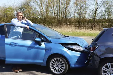 Driver Making Phone Call After Traffic Accident