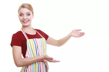 housewife waitress inviting welcome gesture kitchen apron isolated