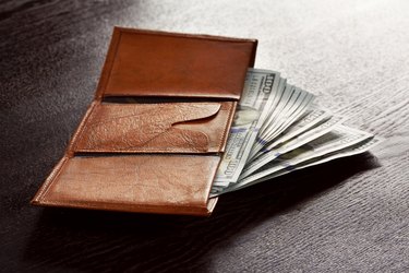 Money in leather wallet