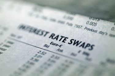 Close-up of current rates printed on paper (Blurred)
