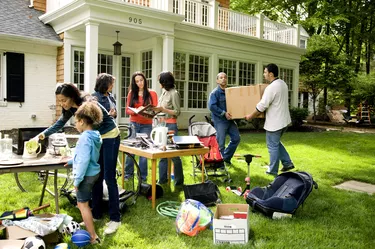 Suburban yard sale, family moving out furniture