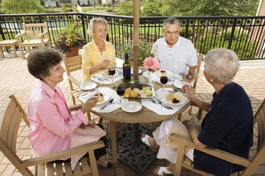 Friends at table on patio
