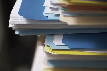 Corner of stack of files, close-up