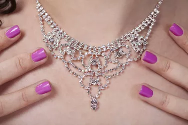 Woman's Neck And Her Beautiful Necklace