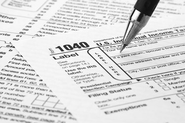 Tax Form 1040 being filled out