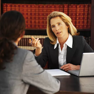 Close-up of two business colleagues having meeting