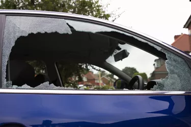 Smashed safety glass in a car door