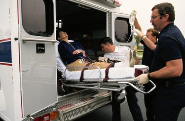 Putting Woman in Ambulance