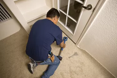Man Installing Carpet