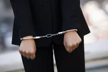 Woman in handcuffs